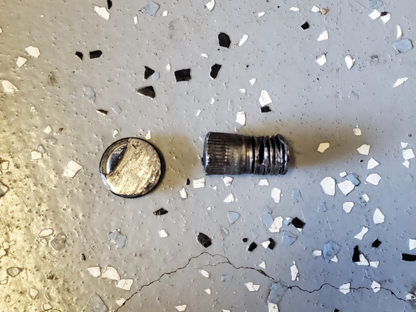 Broken lug stud with head sawed off